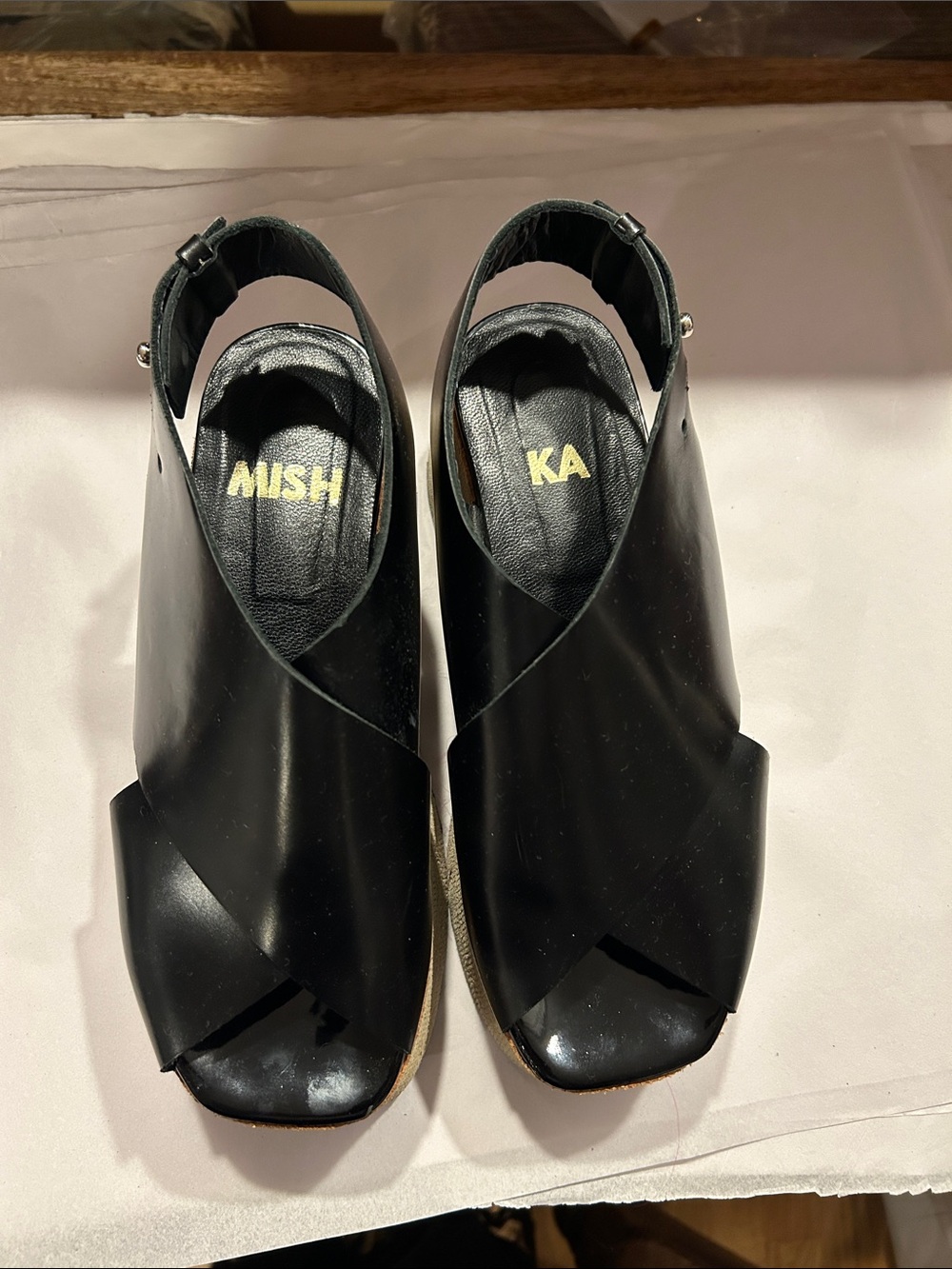 Mishka Black Leather Crisscross Slingback Clogs